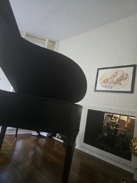 Teresa’s grand piano at home